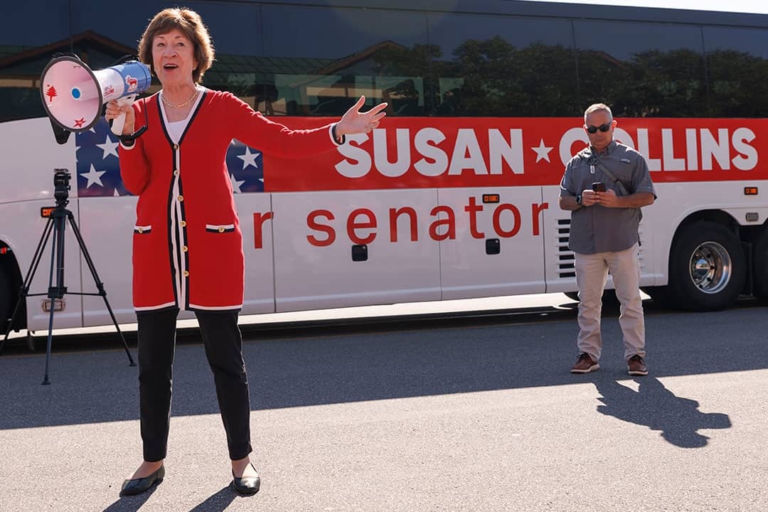 U.S. Sen. Susan Collins (R-ME) greets supporters outside the Kittery Trading Post, the first stop of a weekend re-election campaign bus tour of the state of Maine, on August 14, 2026 in Kittery, Maine. 